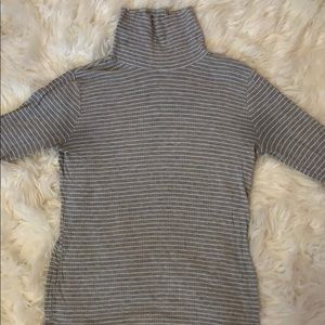 Ribbed gray and white striped turtleneck